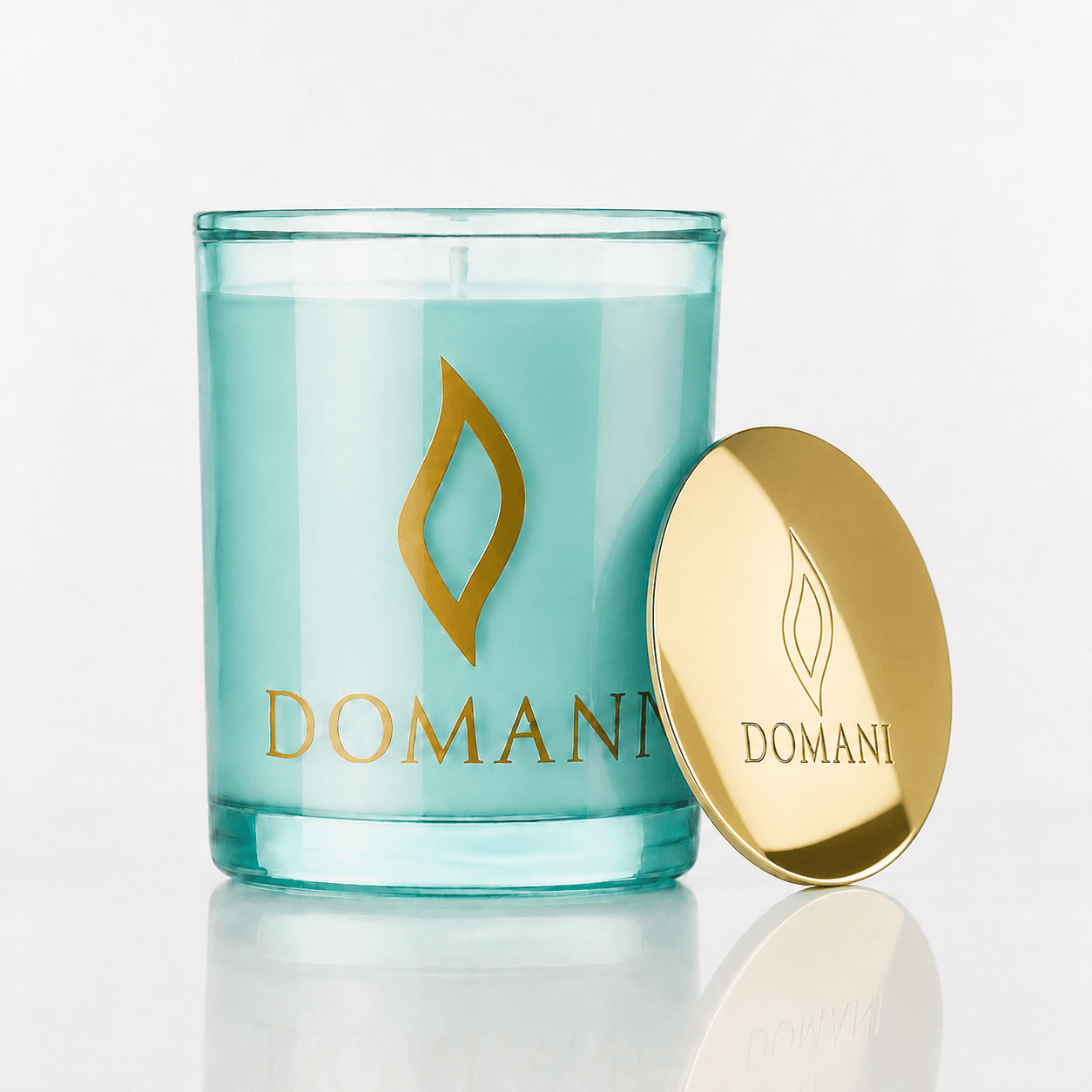 Domani Daydreamer candle, Aquamarine · Lid off, unlit