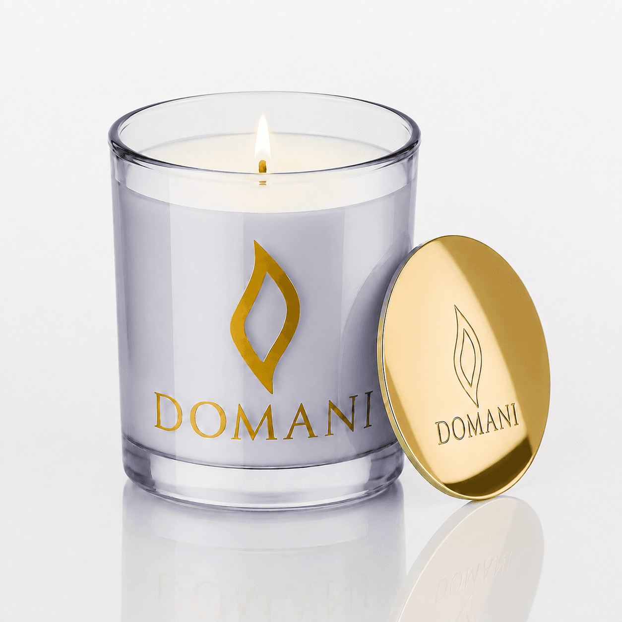 Domani Bibliotheca candle, Sapphire · Lit candle, downward view