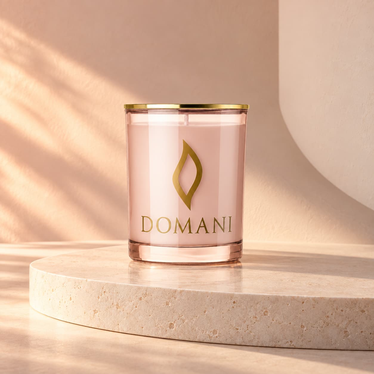 Dolcetta candle in Rose Quartz glass on an ivory podium