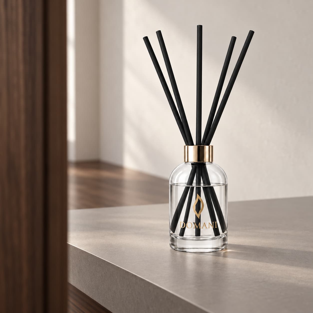 Domani novella reed diffuser in an editorial interior setting.