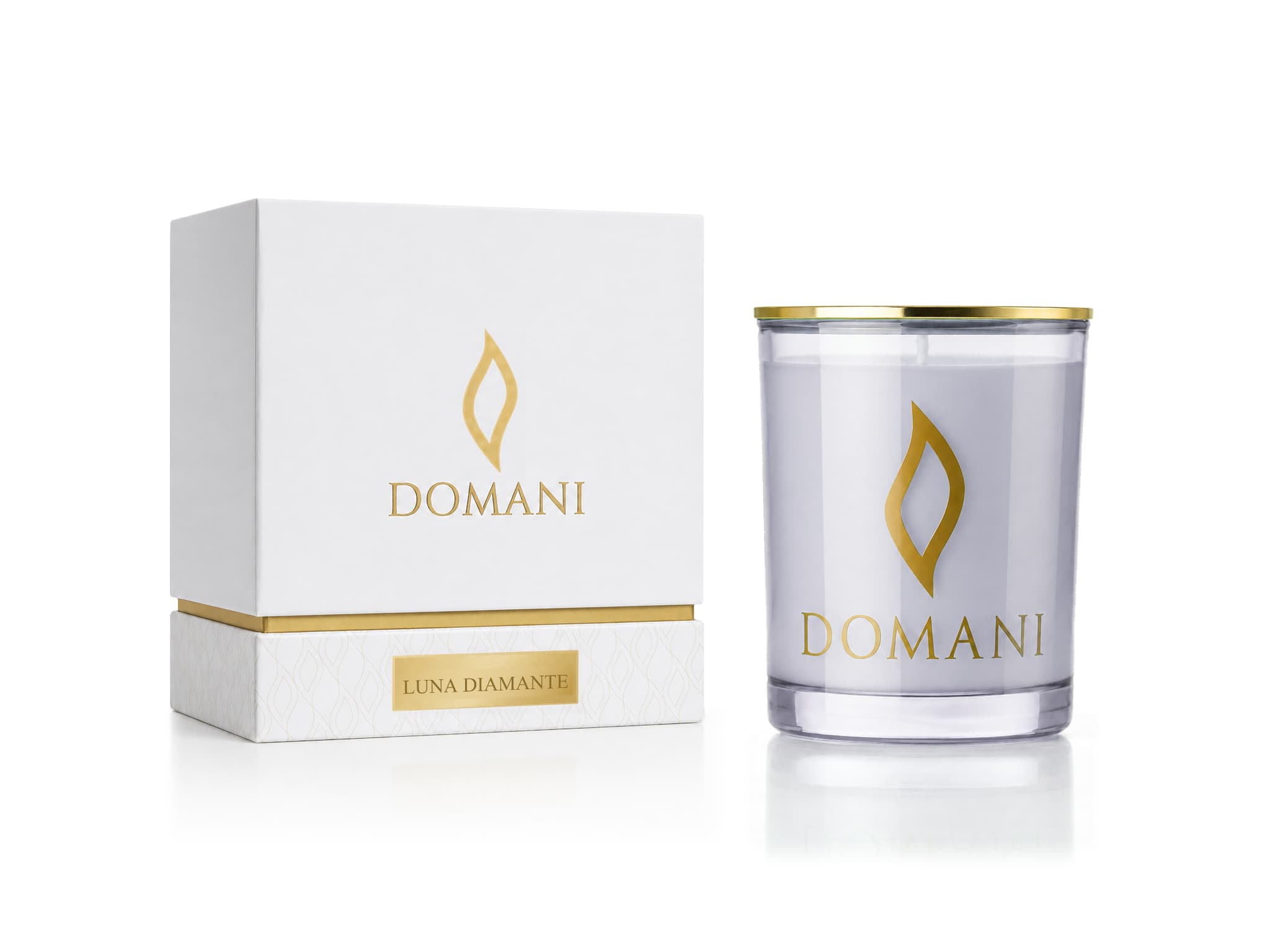 Luna Diamante candle in Sapphire glass beside its named presentation box.