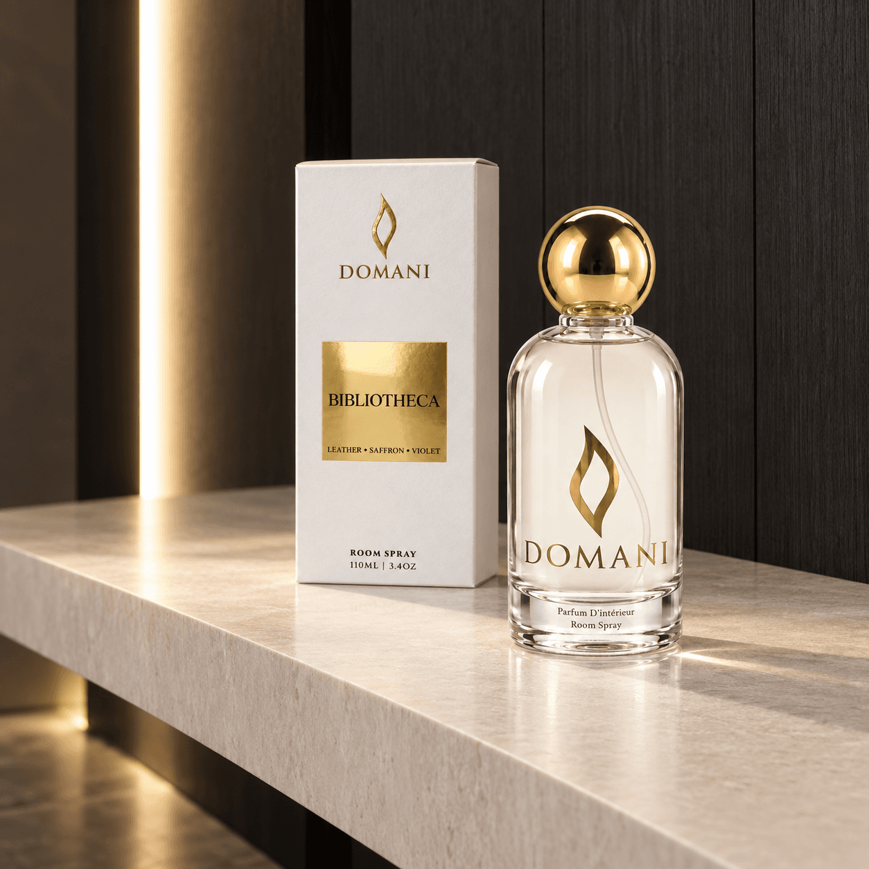 Bibliotheca room spray with its named presentation box, dark-timber console