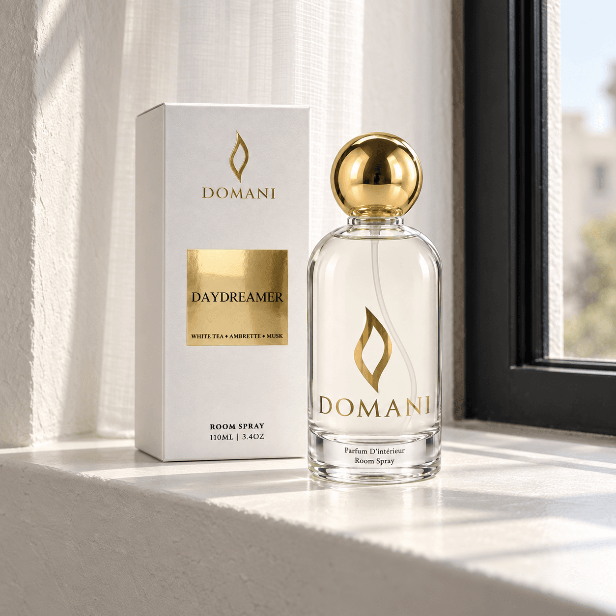 Daydreamer room spray with its named presentation box, window-light pairing