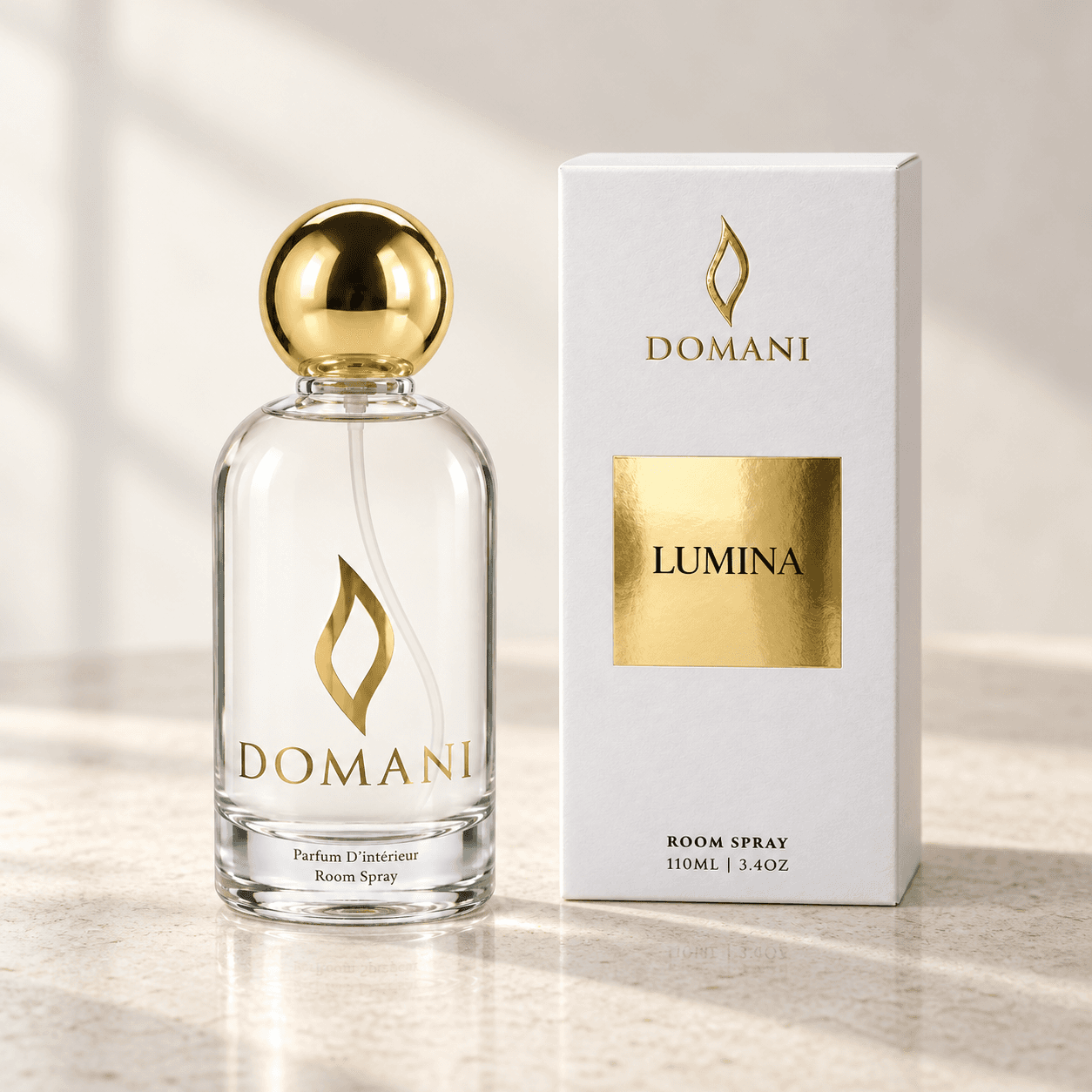 Lumina room spray beside a carton bearing its fragrance name