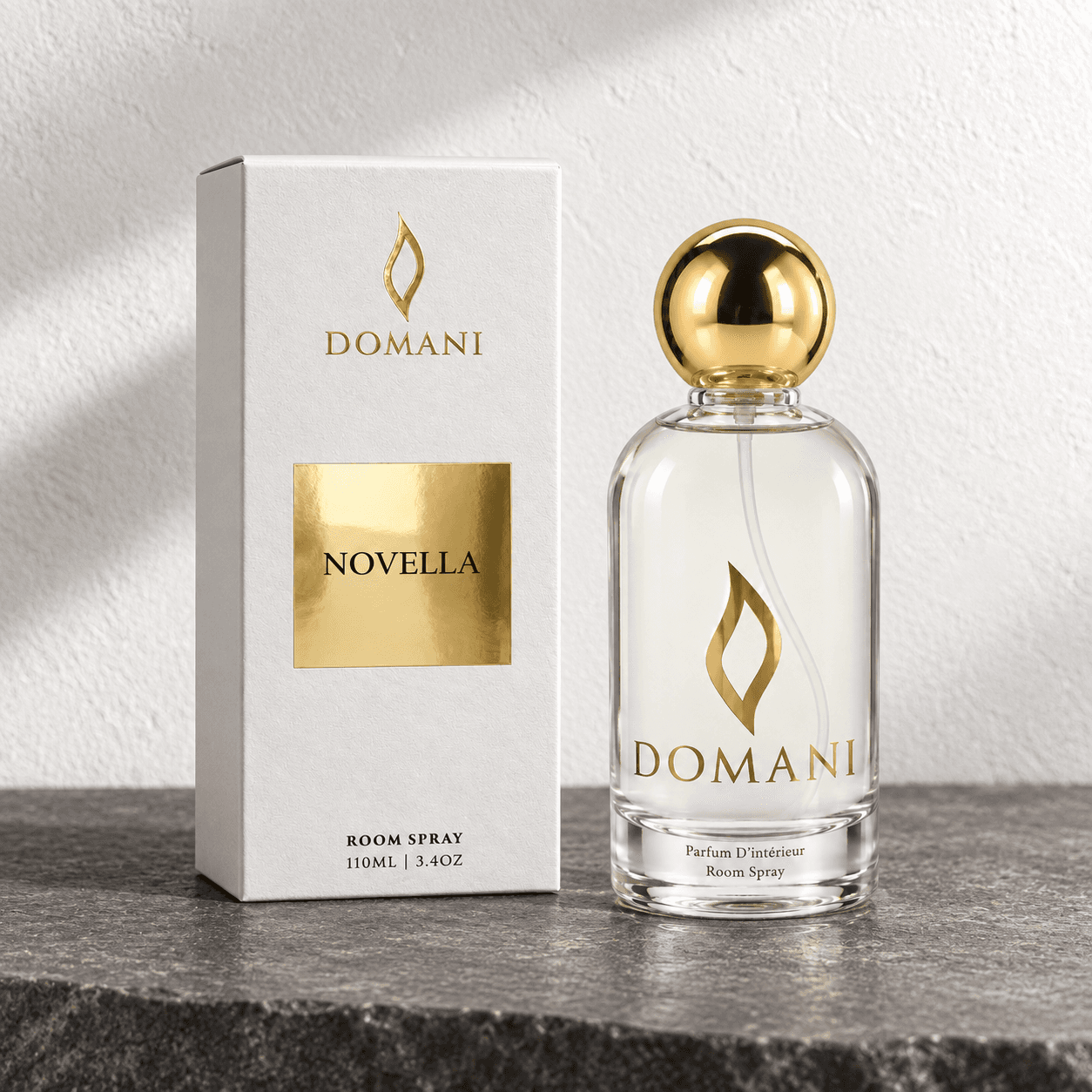 Novella room spray beside a carton bearing its fragrance name