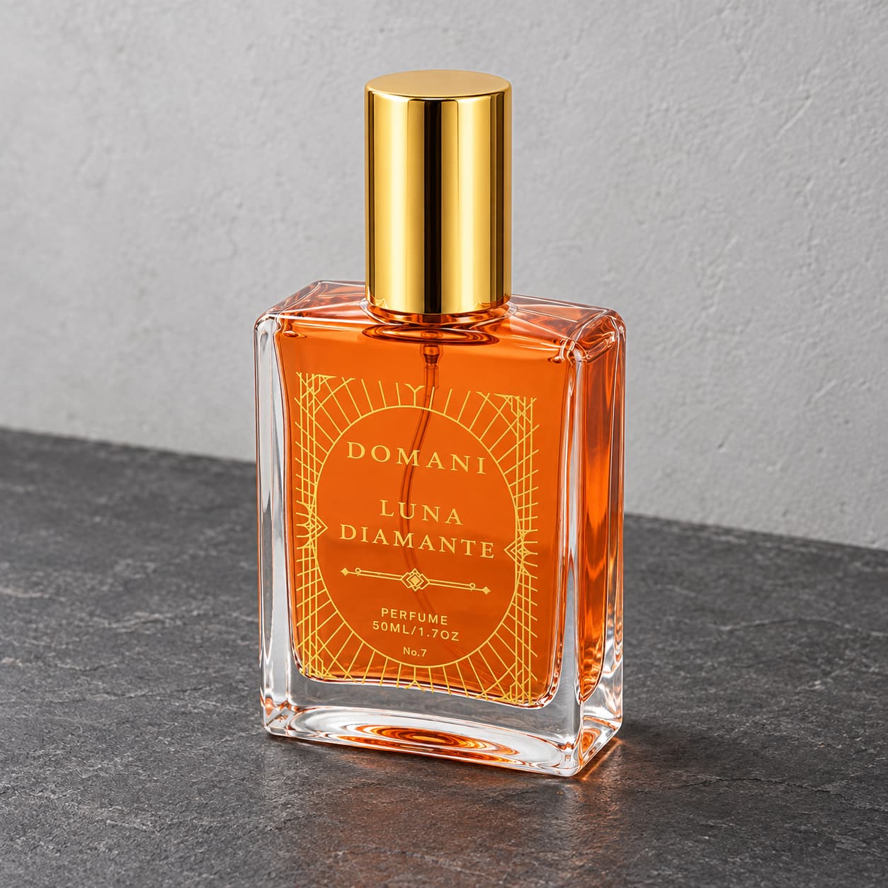 Luna Diamante 50 ml perfume from a three-quarter angle on slate.
